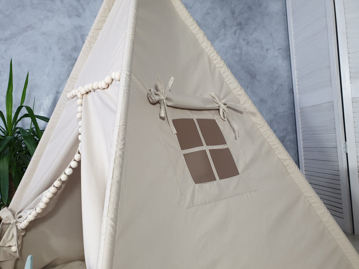 Toddler sitting in cotton play tent Beige Neutral Teepee Tent – Stylish Indoor Playhouse for Boys & Girls | Cozy Cotton Tipi | Christmas Gift for Toddlers hellolittlefox beige-teepee-tent-for-girls-and-boy-handmade-from-hello-little-fox hellolittlefox.myshopify.com