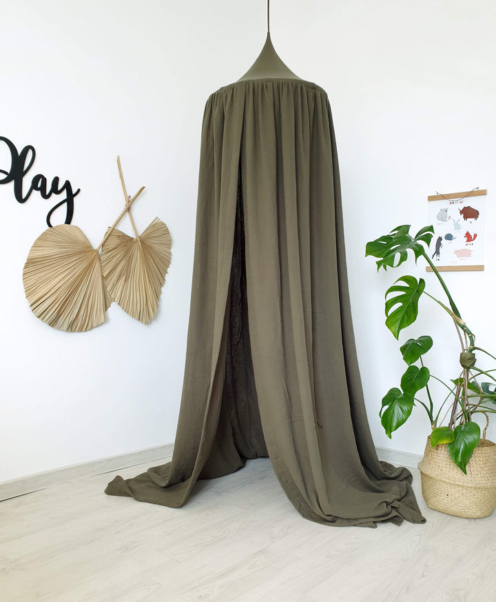 Modern baby room with khaki muslin canopy Khaki Green Muslin Canopy | Hanging Nursery Crib Canopy for Baby or Toddler Room Decor hellolittlefox khaki-green-muslin-canopy-a-stylish-and-functional-nursery-essential hellolittlefox.myshopify.com