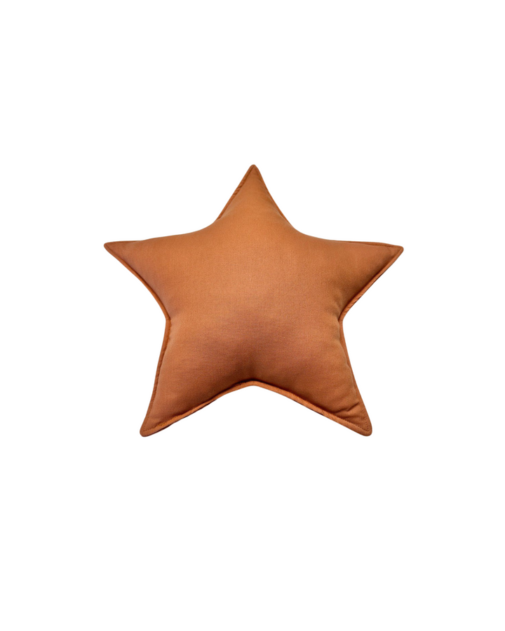 Terracotta linen star-shaped pillow on nursery chair in warm earthy tones 1 Linen star pillow | Terracotta hellolittlefox 1-linen-star-pillow-terracotta hellolittlefox.myshopify.com
