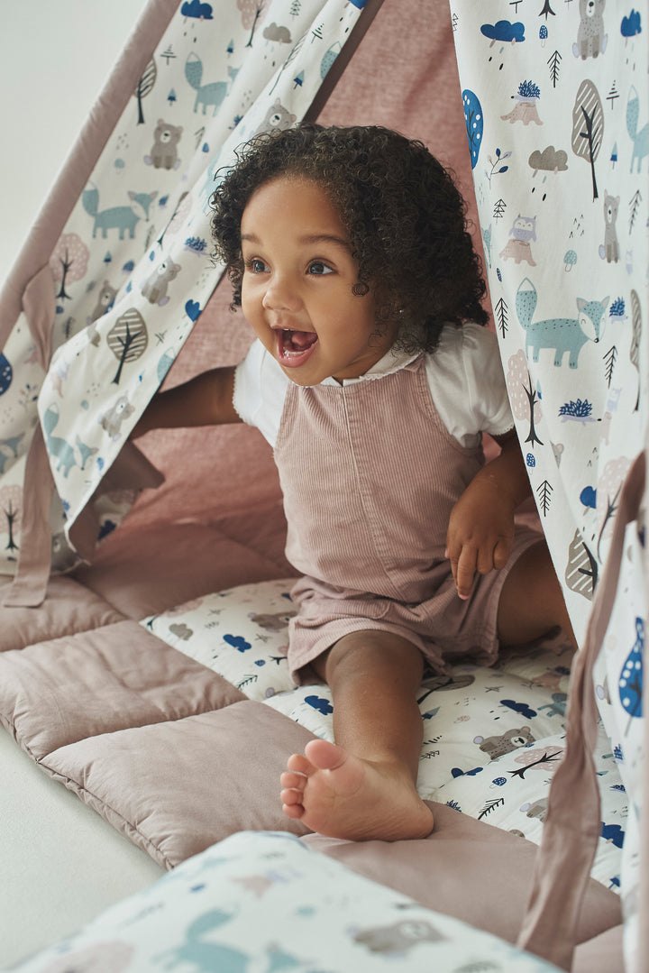 Toddler sitting in gender-neutral teepee Dusty Brown Woodland Teepee Tent for Kids – Indoor Neutral Play Tent | Cozy Toddler Wigwam | Boys & Girls Playhouse hellolittlefox teepee-for-birthday-gift-dusty-brown-woodland-print-teepee-tent-for-kids-indoor-playhouse-playzone-with-neutral-teepee-print hellolittlefox.myshopify.com