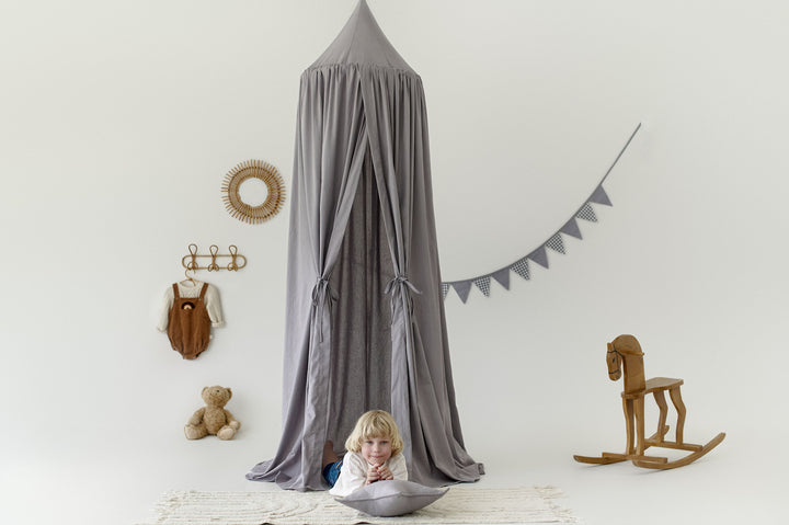 Crib with gray canopy creating cozy sleeping nook Gray Linen Canopy | Neutral Crib Canopy for Nursery | Hanging Roof Canopy | Linen Bed Drape for Baby Room hellolittlefox linen-canopy-baby-crib-canopy-hanging-from-roof-canopy-crib-canopy-canopy-for-crib hellolittlefox.myshopify.com