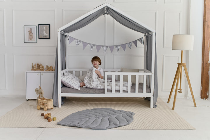 Full-length gray bed curtains softly draped over a wooden bed Gray Linen Baby Canopy Curtains – Perfect for Montessori and House Bed Setups hellolittlefox gray-linen-baby-canopy-new-bed-curtains-perfect-for-montessori hellolittlefox.myshopify.com