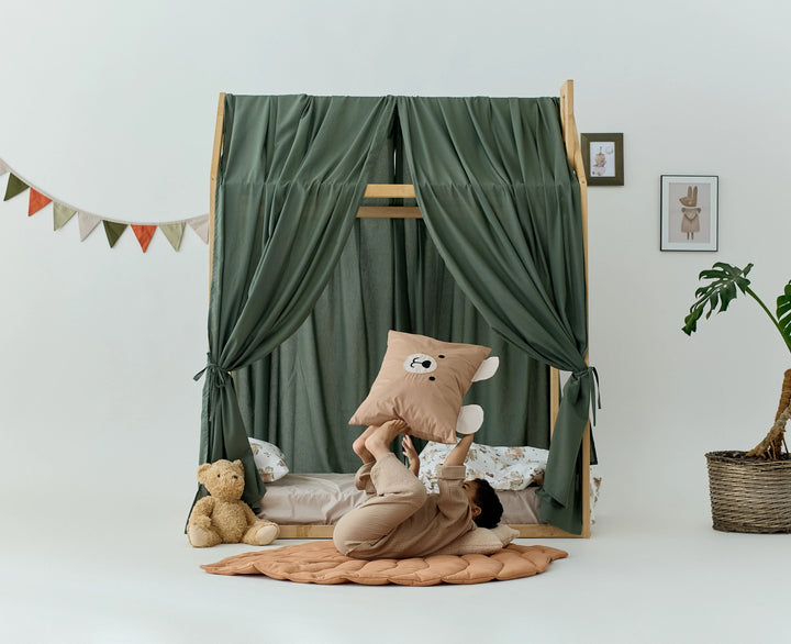 Khaki cotton-linen blend curtains styled on a children's bed frame
