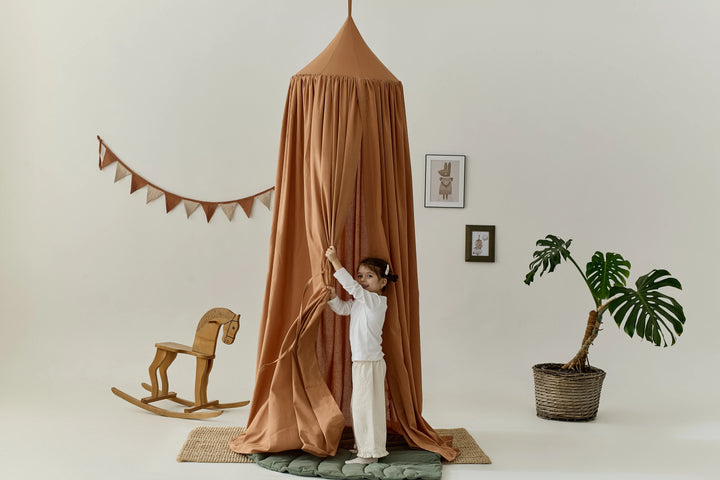 Linen canopy in earthy orange for baby nursery Terracotta Linen Canopy | Boho Crib Canopy & Hanging Bed Canopy for Nursery hellolittlefox terracotta-linen-canopy-boho-crib-canopy-hanging-bed-canopy-for-nursery hellolittlefox.myshopify.com