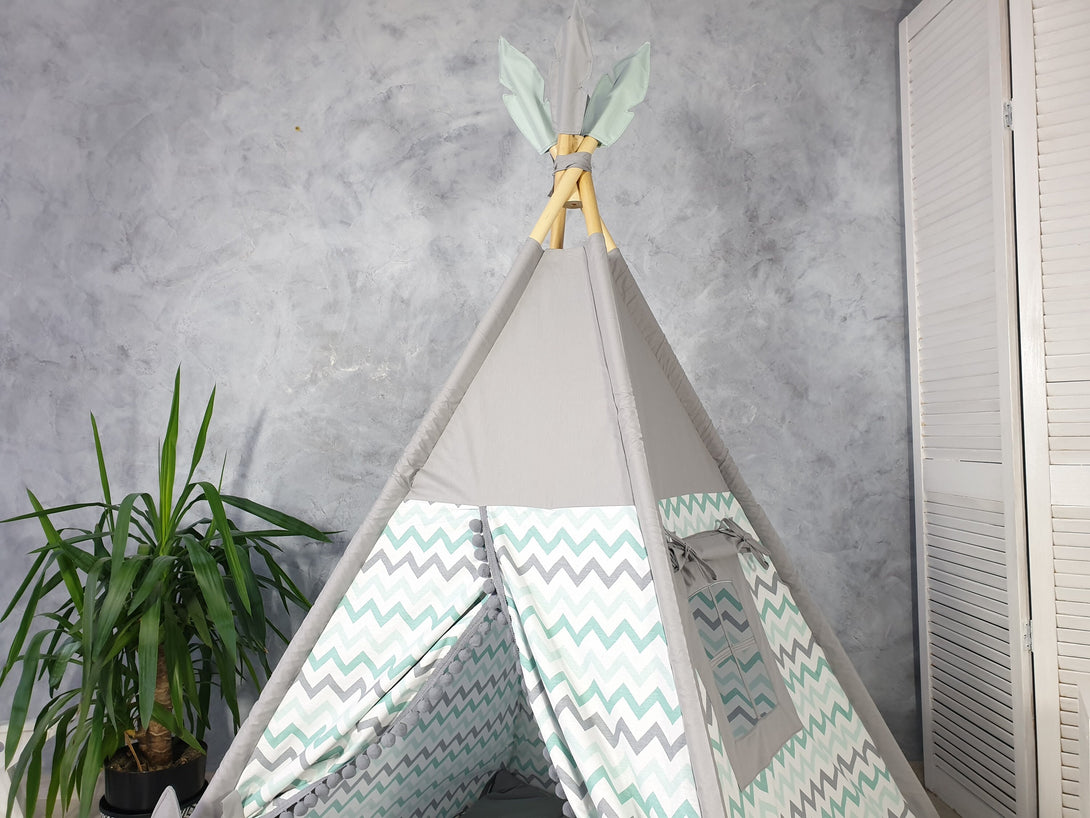 Cozy gray tipi tent for kids, perfect playhouse for indoor use