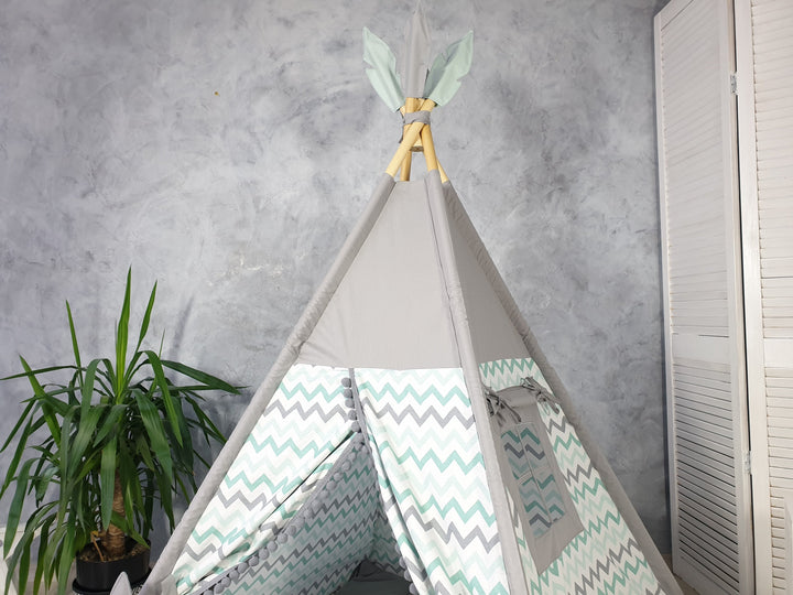 Cozy gray tipi tent for kids, perfect playhouse for indoor use