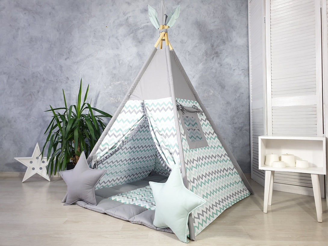 Indoor playzone with a neutral teepee print for kids