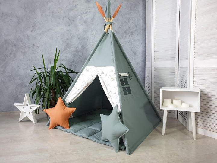 Dusty green color and rainbow print teepee with mat and stars made with cotton fabric and wooden sticks.Fluffy mat and feathers are included. Wooden sticks and fixing kit are included.