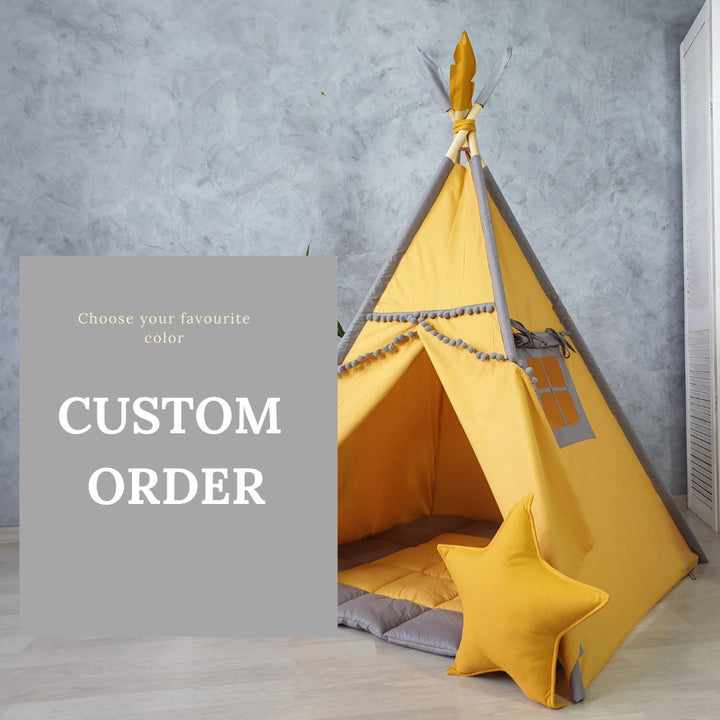 Christmas gift idea: cozy teepee tent in neutral colors for kids&#39; play and nursery decor.