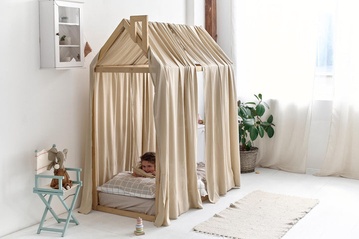 Montessori bedroom setup with beige linen canopy for restful sleep Beige Linen Canopy Curtains for Montessori House Bed | Organic Toddler Bed Canopy for Kids Room Decor hellolittlefox canopy-bed-curtains-aesthetic-room-decor-linen-bed-curtains-nursery-linen-bed-curtains-montessori-house-bed-canopy-toddler-bedding hellolittlefox.myshopify.com