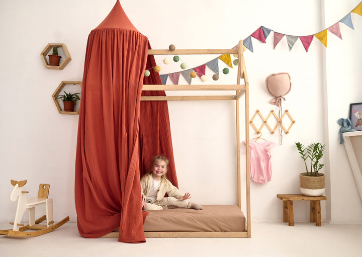 Cotton canopy above wooden house bed Terracotta Muslin Crib Canopy | Cozy Cotton Nursery Baldachin for Baby Bed & Playhouse hellolittlefox canopy-for-crib-muslin-canopy-nursery-canopy-cotton-crib-cover-cozy-nursery-canopy-baldachin-baby-crib-cover-cotton-canopy hellolittlefox.myshopify.com